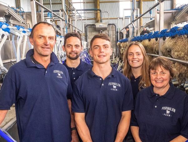 The Ravenwood family: Jeff, Ben, Cameron, Baeley, and Shirley in the Fernglen milking shed.